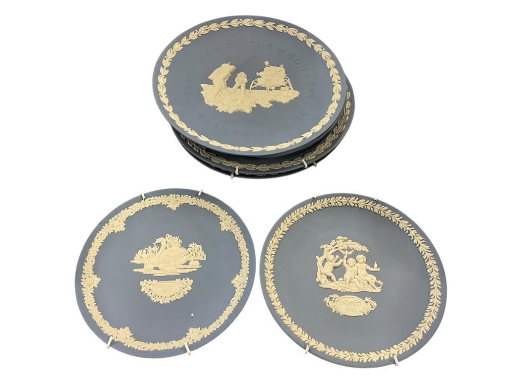 SEVEN WEDGWOOD ENGLISH BONE CHINA PLATES FEATURING "APOLLO ELEVEN MAN ON THE MOON": ALSO INCLUDES CHRISTMAS PLATES FROM THE 1980'S AND 1990'S, AS WELL AS MOTHER'S DAY PLATES FROM 1978 AND 1985, ALL MARKED ON BOTTOMS LARGEST PLATE IS 8 1/2"