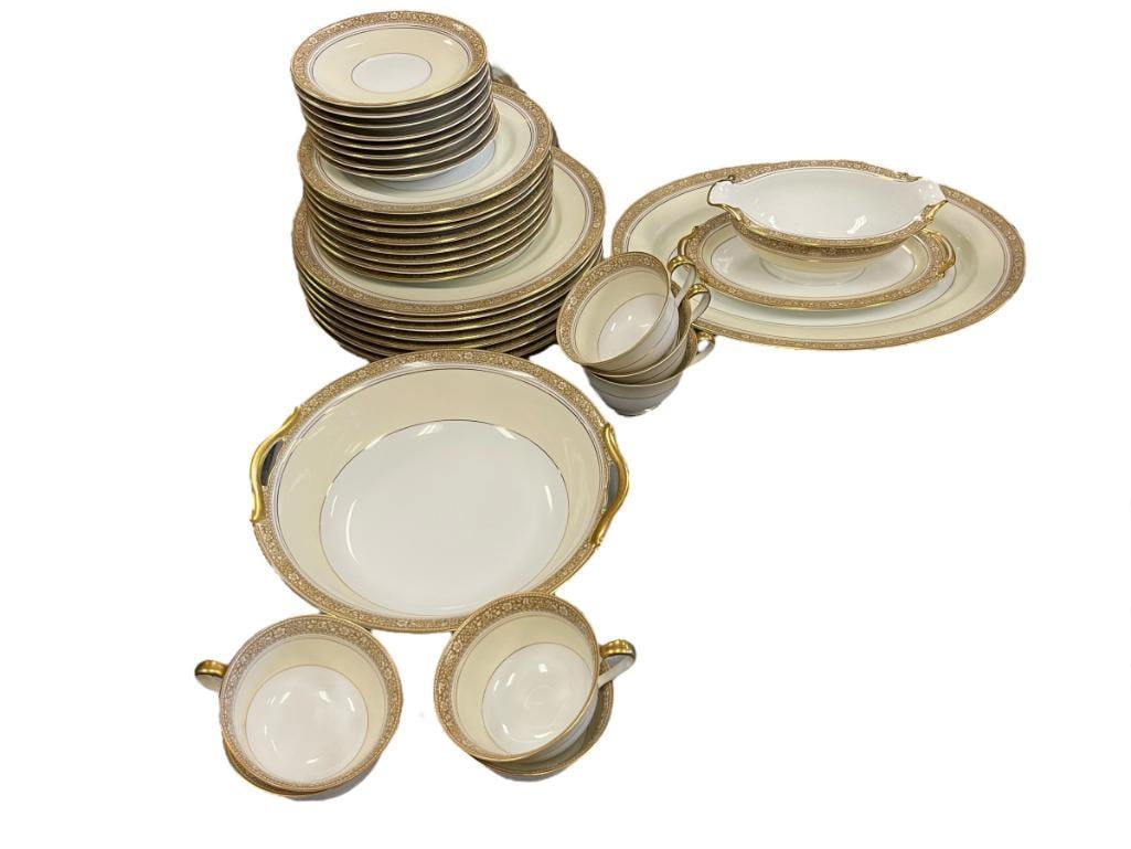 VINTAGE NERISSA NORITAKE FLORAL PATTERN CHINA SET NO. 68624: NERISSA NORITAKE BROWN FLORAL PATTERN CHINA SET WITH GILT TRIM AD ACCENTS, MANUFACTURED IN 1939, INCLUDES 34 PIECES, TEA CUPS, DINNER PLATES, SALAD PLATES, SAUCERS, GRAVY BOAT AND SERVING PLATTER, NO