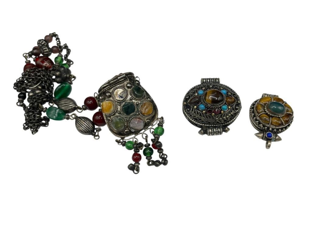 THREE VINTAGE STYLE MIDDLE EASTERN STONE ACCENTED SILVER-PLATED PILL BOX PENDANTS: INCLUDES ONE WITH CHAIN, STONES INCLUDES TIGER'S EYE, AMETHYST, AND GLASS BEADS 33" NECKLACE WITH 2 1/2" PENDANT