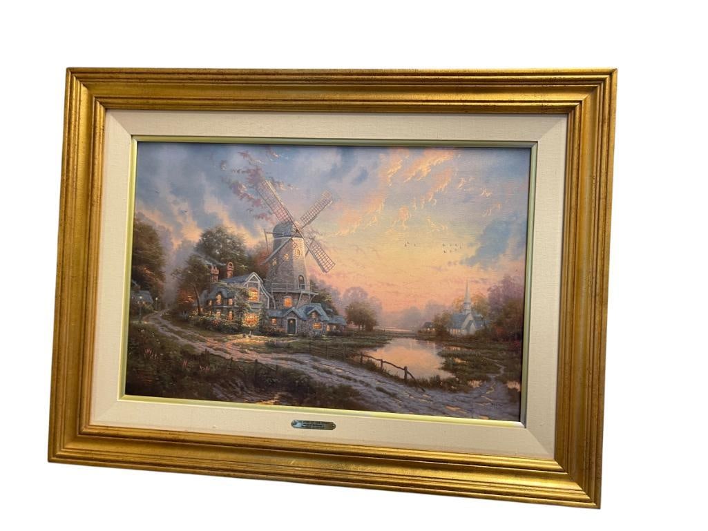 THOMAS KINKADE WINDMILL COLLECTION I PRINT ON CANVAS TITLED THE WIND OF THE SPIRIT: -THOMAS KINKADE (1958-2012) LIMITED EDITION PRINT ON CANVAS FROM THE WINDMILL COLLECTION I TITLED THE WIND OF THE SPIRIT, DEPICTS WINDMILL NEAR BODY OF WATER WITH COTTAGE AND CHURCH IN BACKGROUND