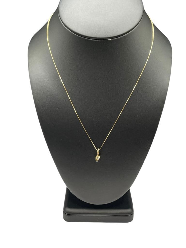 14K YELLOW GOLD DIAMOND PENDANT NECKLACE: DESIGNER HALLMARKED PENDANT FEATURING ROUND BRILLIANT CUT DIAMOND ON 10K YELLOW GOLD CHAIN NECKLACE 18" NECKLACE, 5/8" PENDANT, .14CT DIAMOND, 1.51 GRAMS