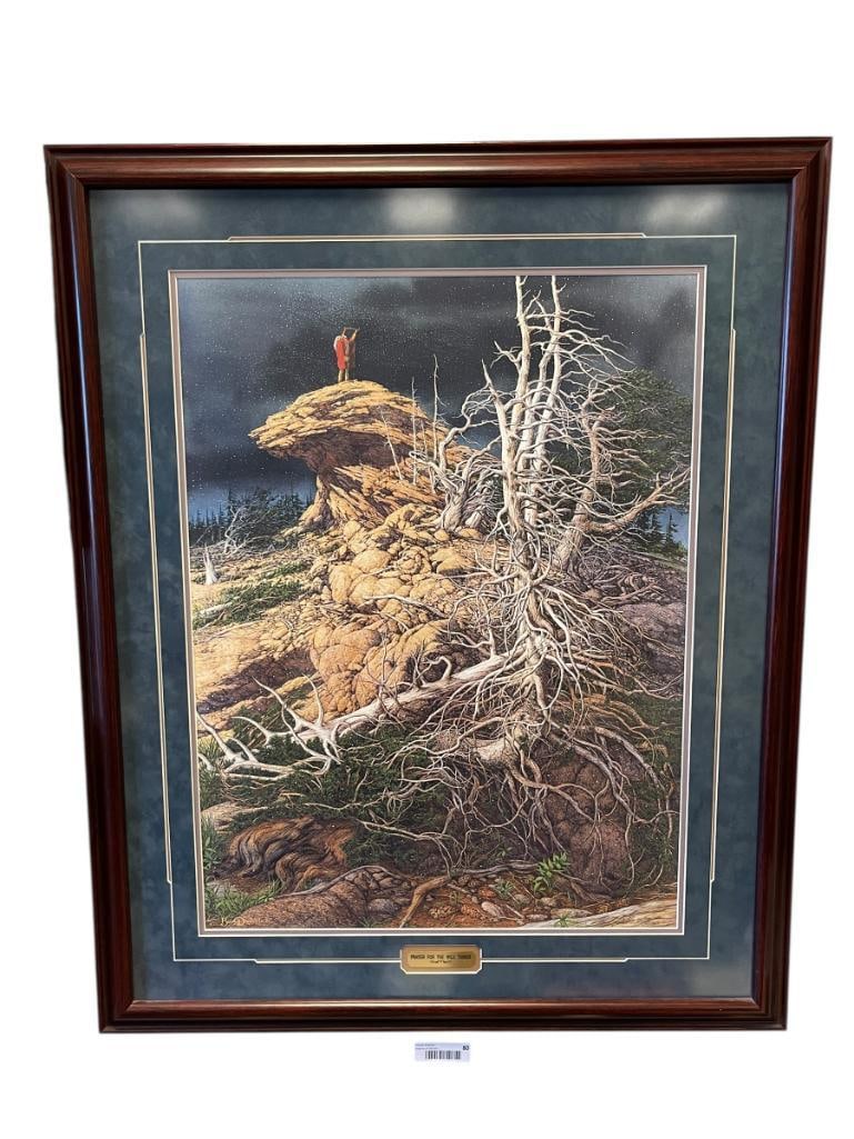 BEV DOOLITTLE WILDLIFE AND NATIVE AMERICAN ARTIST LIMITED EDITION PRINT PRAYER FOR THE WILD THINGS: BEV DOOLITTLE (1947 - ) CALIFORNIA BORN ARTIST OF WESTERN WILDLIFE AND NATIVE AMERICAN LIFE, PRINT DEPICTS NATIVE AMERICAN MAN STANDING ON AN EAGLE HEAD SHAPED CLIFF HOLDING AN ITEM UP TO THE SPIRITS,