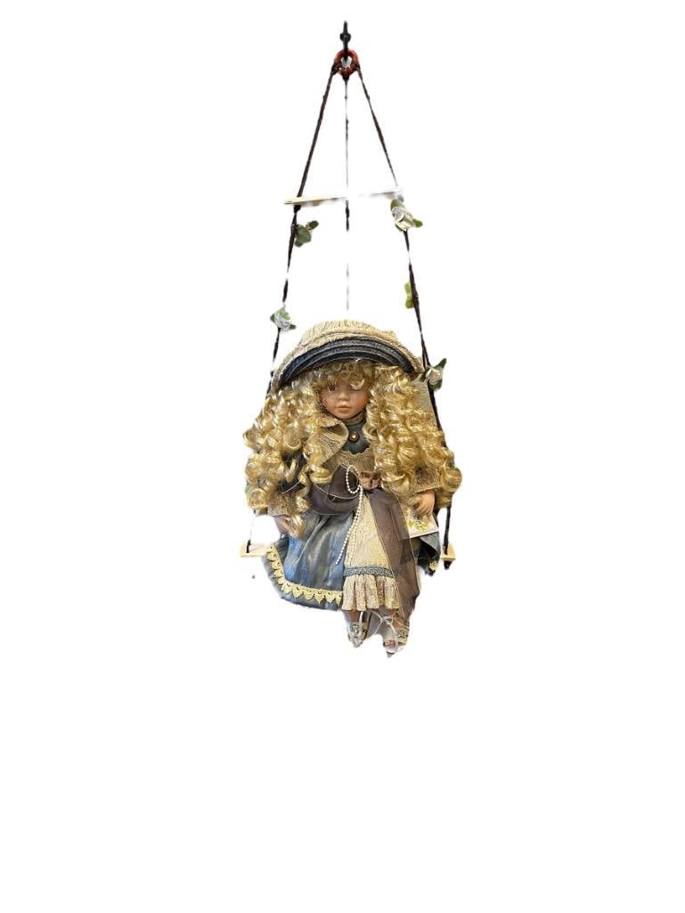 CATHAY COLLECTION FLORA BISQUE PORCELAIN DOLL: DOLL WITH SWING, MARKED ON BACKSIDE OF THE NECK, INCLUDES CERTIFICATE OF AUTHENTICITY, DOLL BOX INCLUDED, BUT NOT THE ORIGINAL BOX 15" H