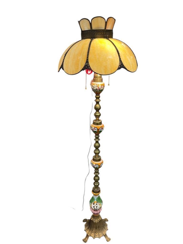 20TH CENTURY VINTAGE ITALIAN CAPODIMONTE AND BRASS FLOOR LAMP WITH SAG GLASS SHADE: CAPODIMONTE CHERUB HAND PAINTED AND BRASS COLUMN WITH FOUR FOOTED HEAVY BRASS BASE, TWO BULB LAMP, LIGHTS TURN ON AND OFF BUT THE PLASTIC FIXTURES WILL NEED TO BE REPLACED, INCLUDES VINTAGE 1920'