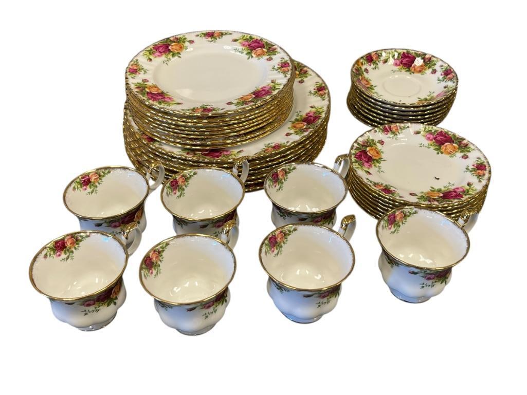 ROYAL ALBERT OLD COUNTRY ROSES ENGLISH BONE CHINA DINNERWARE SET, SETTING FOR 8: PATTERN WAS INTRODUCED IN 1962, FEATURES FLORAL DESIGN WITH GILT RIMS, INCLUDES DINNER PLATES, SALAD PLATES, DESSERT PLATES, SAUCERS, AND CUPS, MISSING ONE CUP, MADE IN ENGLAND