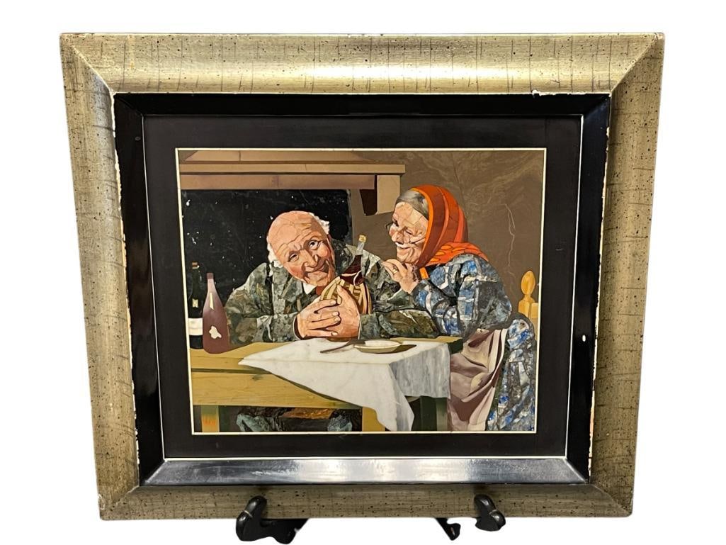 20TH CENTURY SEMI-PRECIOUS STONE INLAY ART OF A EUROPEAN ELDER COUPLE BY VELGA: STONE ILLUSTRATION OF TWO ELDER COUPLES SITTING NEAR A TABLE, SIGNED VELGA BOTTOM LEFT, FRAMED 14 1/4" X 12 7/8"