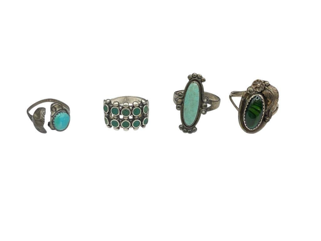 FOUR VINTAGE NATIVE AMERICAN STERLING SILVER RINGS FEATURING TURQUOISE, MALACHITE, AND MORE (1 of 9)
