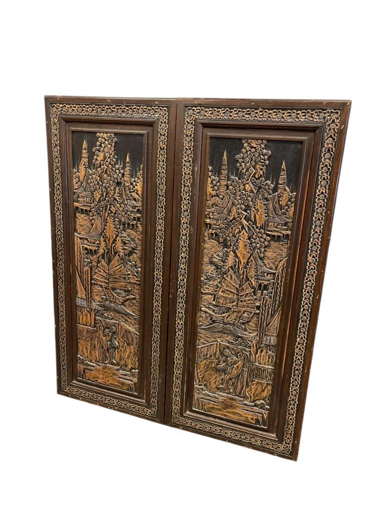 ASIAN INSPIRED OFFICIAL SIZE ILLUMINATED DART BOARD CABINET: LARGE DAR BOARD CABINET WITH 3D STYLE CARVED TRADITIONAL DESIGN ON FRONT DOORS, FEATURES DRY ERASE SCORE SHEET WITH DART RACK, LIGHT WILL NEED TO BE REPLACED OR REWIRED, SHOWS WEAR 32" X 38" X 5 1/4"