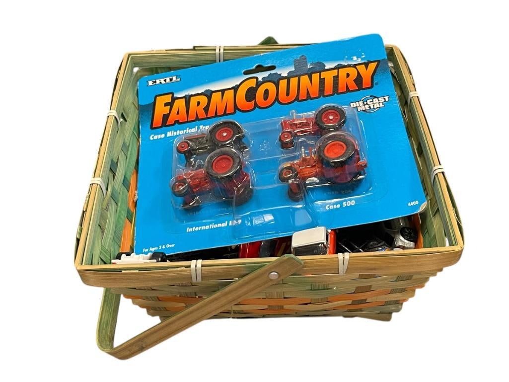 WICKER BASKET FULL OF MATTEL HOT WHEELS CARS AND A NEW ERTL FARM COUNTRY METAL MINIATURES PKG 1997: SOME HOT WHEELS ARE VINTAGE AND POSSIBLY COLLECTIBLE, APPROX 25 CARS 4" LARGEST CAR 9" X 9" X 4 1/2" BASKET