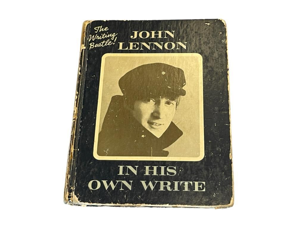 SIGNED 1964 JOHN LENNON IN HIS OWN WRITE ILLUSTRATED BOOK SECOND PRINTING SIMON & SCHUSTER INC.: SIGNED TITLE PAGE JOHN LENNON, COVER ILLUSTRATION BY ROBERT FREEMAN, HARDBACK BOOK, SHOWS WEAR ALONG THE EDGES AND COVERS 5 1/2" X 7 1/8