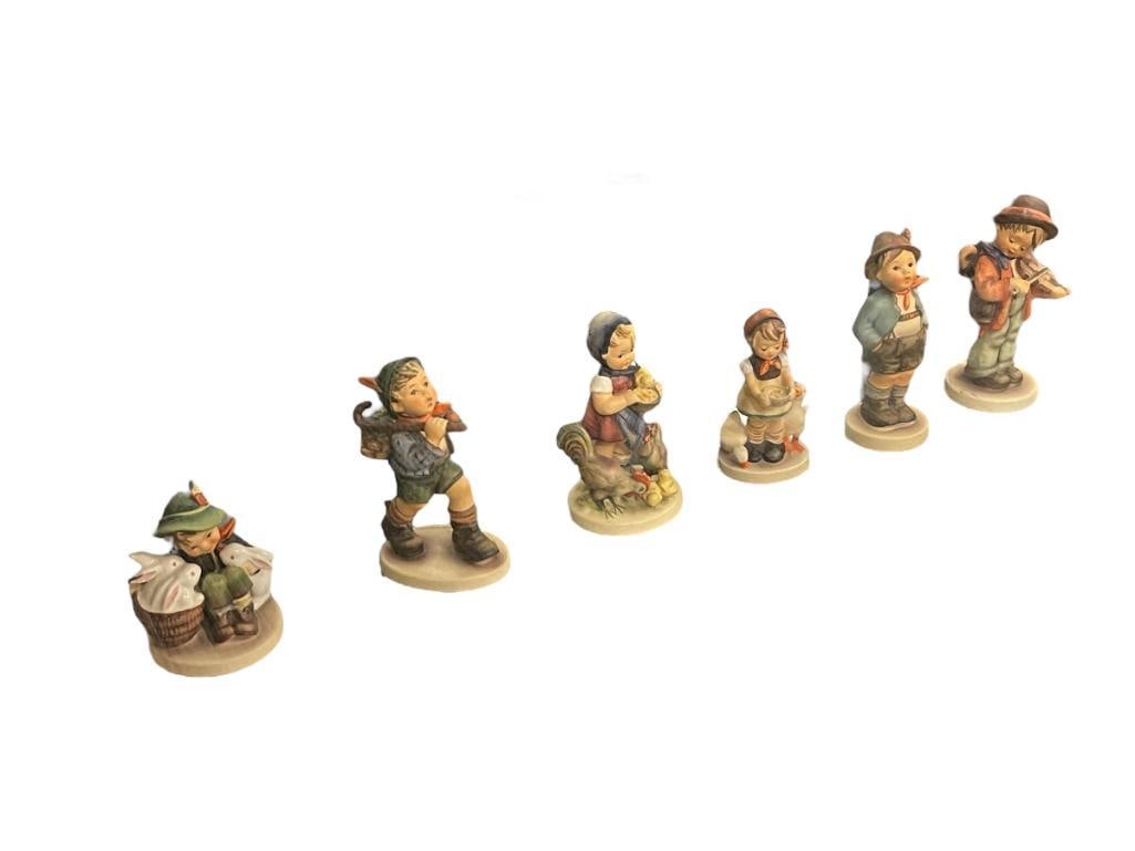 SIX GOEBEL HUMMEL FIGURINES: BE PATIENT 197/2/0 TMK. 4, FEEDING TIME 199 TMK. 4, BROTHER 95 TMK. 5, RUN-A-WAY 327 TMK. 5, PLAYMATES 58/O TMK. 5, AND LITTLE FIDDLER 2/0 TMK. 5 4" UP TO 5 3/4" H