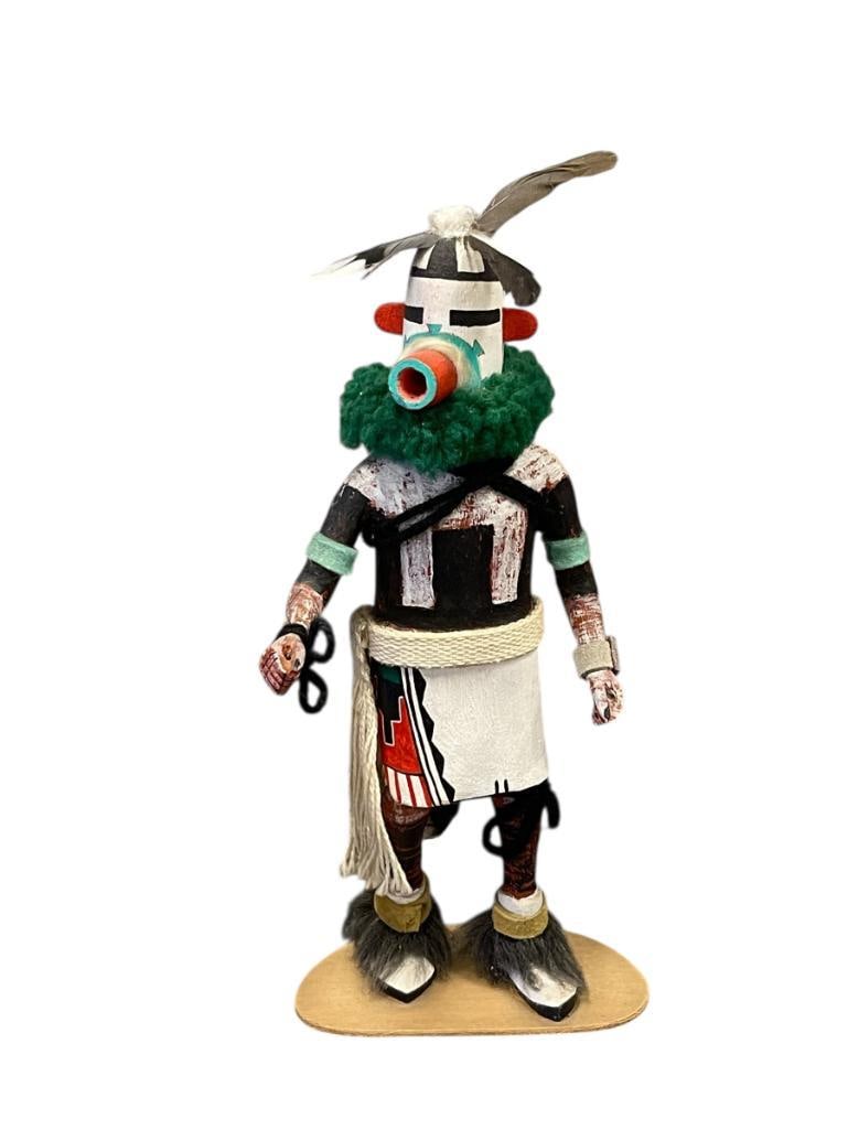HOPI SOUTHWEST NATIVE AMERICAN HAND CRAFTED KACHINA DOLL: RAFTED FROM COTTON WOOD, HAND DECORATED WITH FEATHERS AND HAND PAINTED DESIGN, MOUNTED ON THIN WOOD BASE, NO MARKS OR SIGNATURES 10 1/2" H