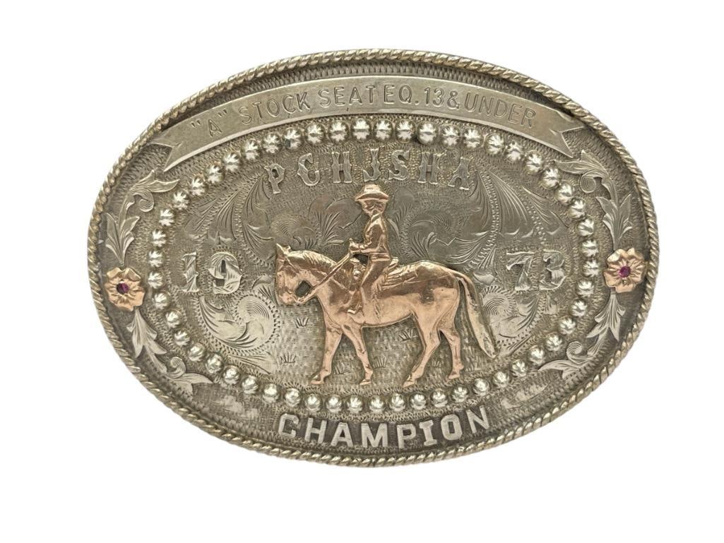VINTAGE STERLING SILVER 1973 "A STOCK SEAT E.Q. 13 & UNDER" CHAMPIONSHIP BELT BUCKLE PCHJSHA BY V...: PACIFIC COAST HORSE JUNIOR SHOW HORSE ASSOCIATION, STAMPED "MEXICO" AND HALLMARKED BY MAKER, TWO TONE DESIGN WITH GOLD FILLED ACCENTS 4", 130.36 GRAMS
