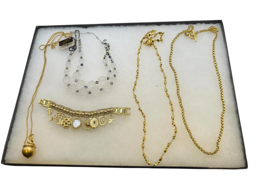 ANNE KLEIN GOLD TONE DESIGNER JEWELRY FEATURING CHARM BRACELET AND FOUR NECKLACES (1 of 10)