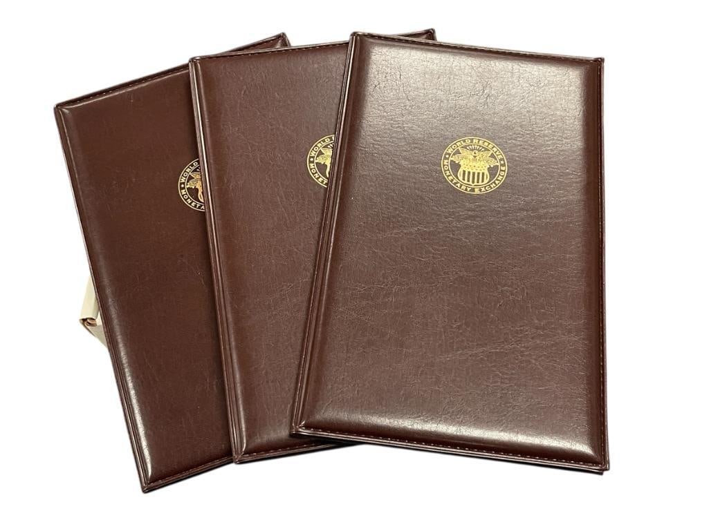 WORLD RESERVE MONETARY EXCHANGE UNCUT SHEET OF $1 BILLS THREE SHEETS TOTAL WITH FOLIO (1 of 7)