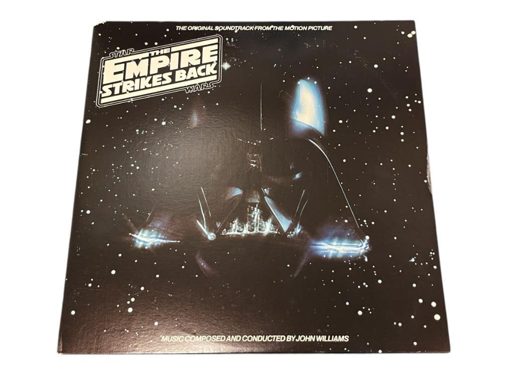 1980 LUCAS FILM LTD. STAR WARS THE EMPIRE STRIKES BACK ALBUM SOUNDTRACK WITH JOHN WILLIAMS BOOKLET: INCLUDES ALBUM COVER, COVER AND ALBUMS, TWO LP RECORD / ALBUM SET, IN GOOD CONDITION, ALBUM COVER HAS DAMAGE TO UPPER LEFT CORNER