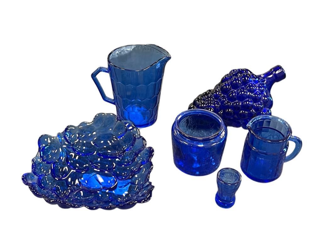 ASSORTED COBALT BLUE GLASSWARE: MOSSER GLASS MINIATURE PITCHER, SMALL BOWL, AND TOOTHPICK HOLDER, PLUS GRAPEVINE BOTTLE AND BERRY BOWL 1 3/4" UP TO 7"