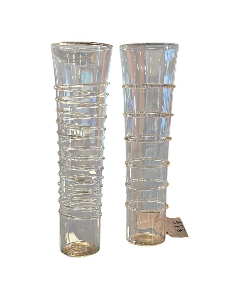 TWO VINTAGE CHAMPAGNE GLASSES FEATURING A SPIRALING RIBBED DESIGN AND RIBBED BANDS ON OTHER: NO CHIPS OR CRACKS 7" H
