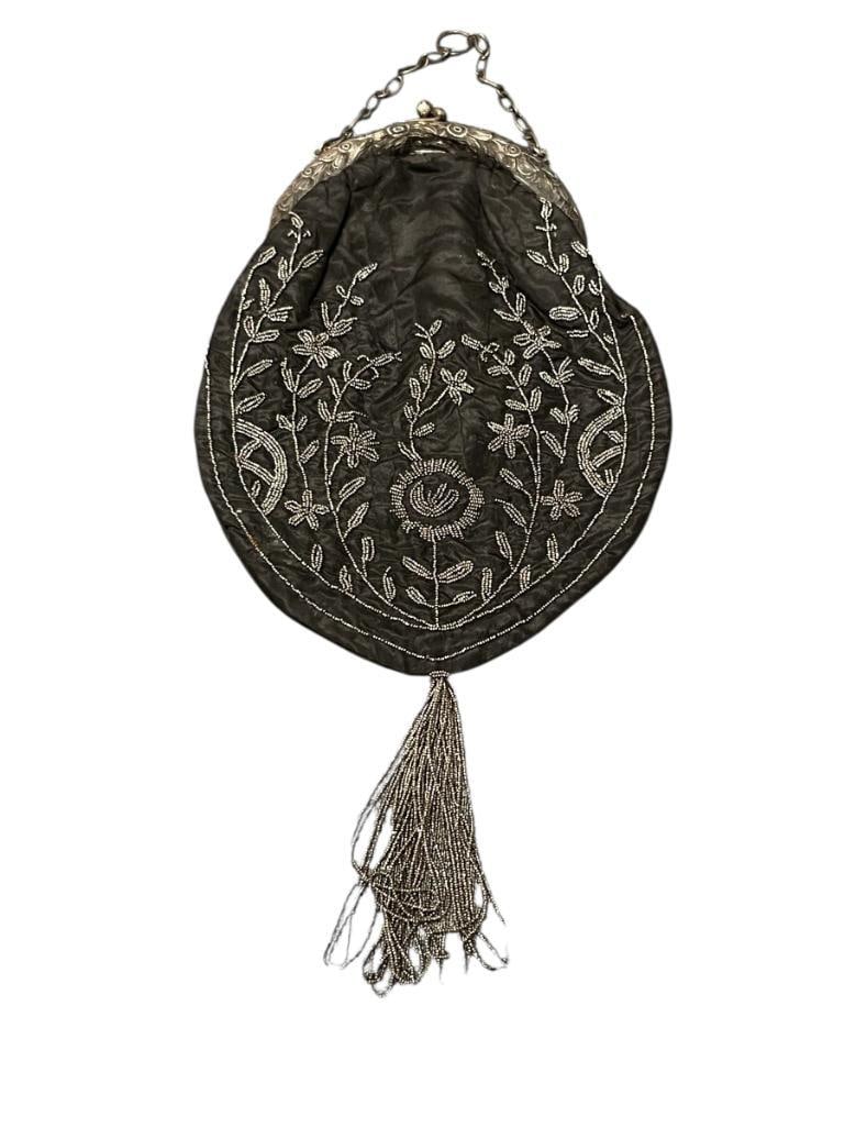 VINTAGE STERLING SILVER ART NOUVEAU FRAMED LADIES PURSE FEATURING BEADED FOLIAGE DESIGN: BLACK FABRIC BAG WITH BEADED DANGLES AT BASE OF PURSE, SOME DAMAGE TO FABRIC, HALLMARKED BY MAKER ON STERLING, MARKED "306" 6 1/2" X 10" PURSE WITH 4" DANGLES