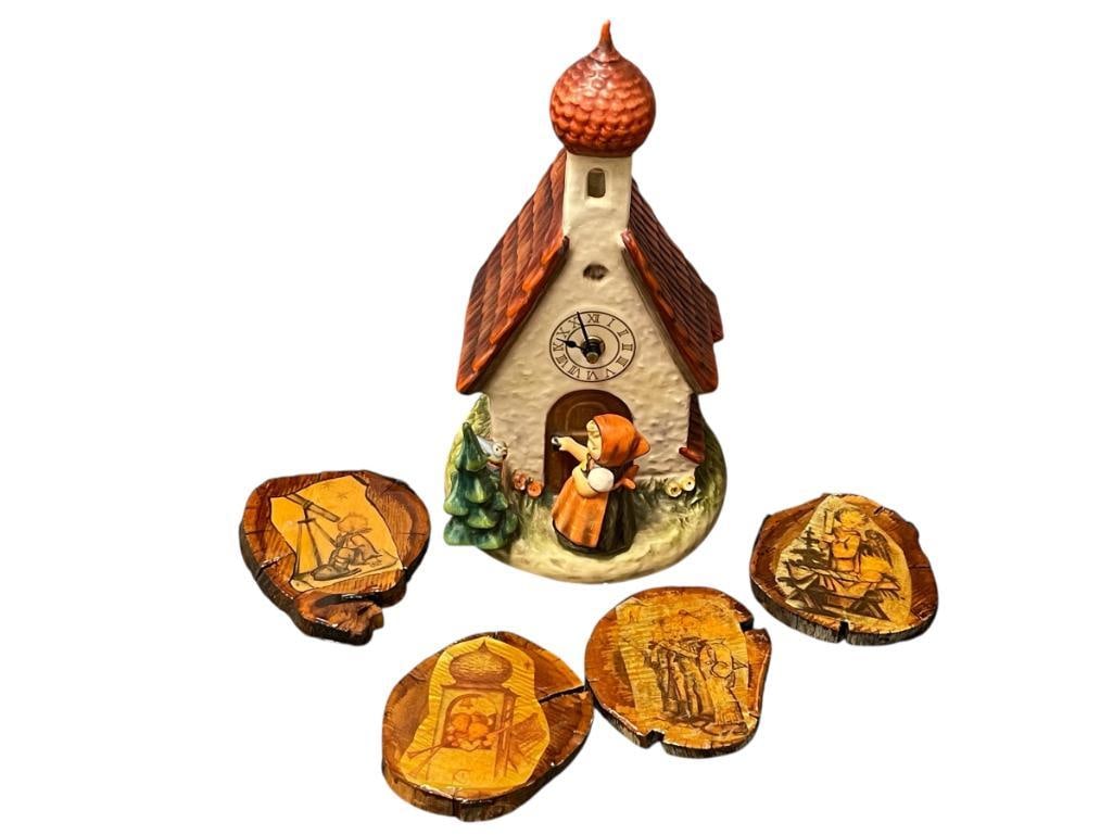 VINTAGE 1980'S GERMAN GOEBEL HUMMEL CHAPEL TIME 442 PORCELAIN FIGURINE AND FOUR WOODEN COASTERS: FIGURINE HAS BEEN REPAIRED, SIGNED BY ARTIST ON BOTTOM AND HALLMARKED, DATED "15.10.86," COASTERS HAVE NICE LACQUER 11 1/2" FIGURINE, 4 1/2" COASTERS