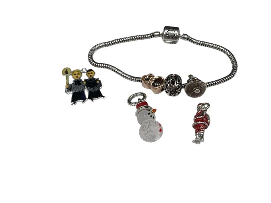 ASSORTED CHRISTMAS HOLIDAY THEMED STERLING SILVER JEWELRY CHARMS AND PERSONA STERLING BRACELET: PANDORA STYLE DESIGN, CHARMS INCLUDE SANTA CLAUS AND ETCHED CRYSTAL SNOWMAN 7 1/2", 28.96 GRAMS