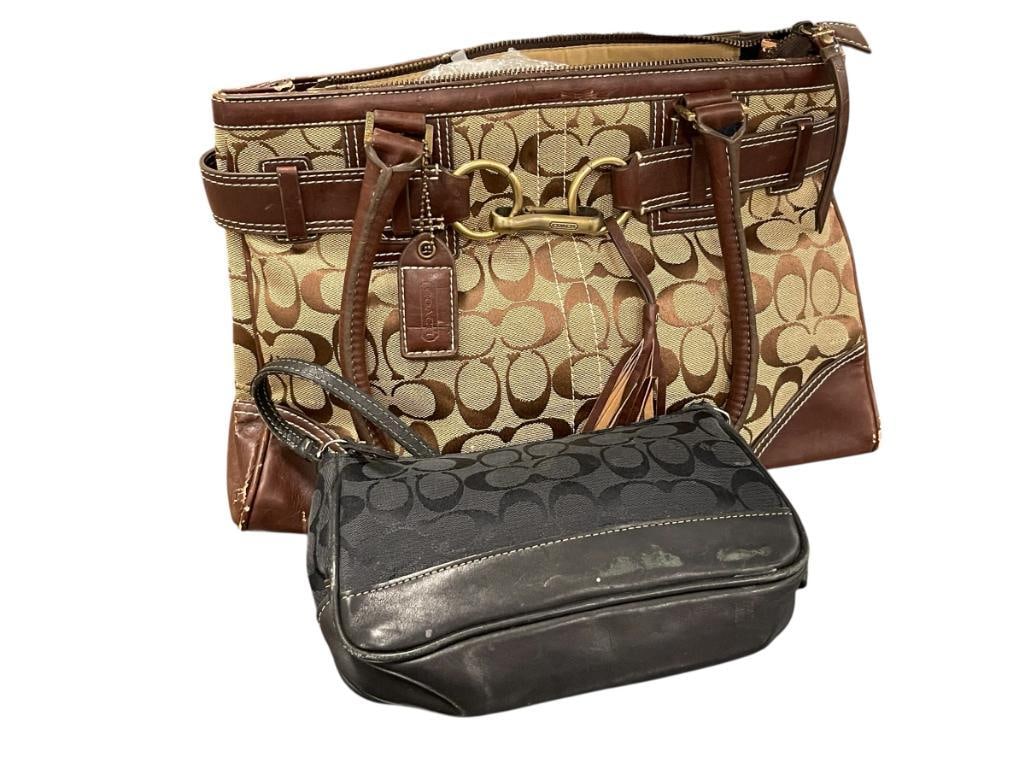 COACH CLASSIC MONOGRAM BLACK WRSITLET AND TOTE: CANVAS WITH LEATHER TRIM, BOTH SHOW SIGNS OF USE 8 1/2" X 5" WRISTLET, 14" X 5" X 9 1/2" TOTE