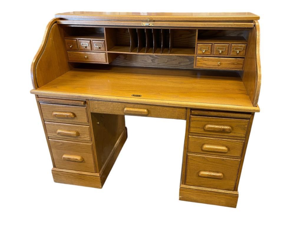 OAK THREE-PIECE ROLLTOP DESK: FEATURES SEVEN EXTERIOR DRAWERS AND EIGHT INTERIOR DRAWERS WITH SLOTS FOR MAIL AND LETTERS, MISSING BACK BOARD, INCLUDES KEY TO LOCK TOP 54" X 29" X 47"