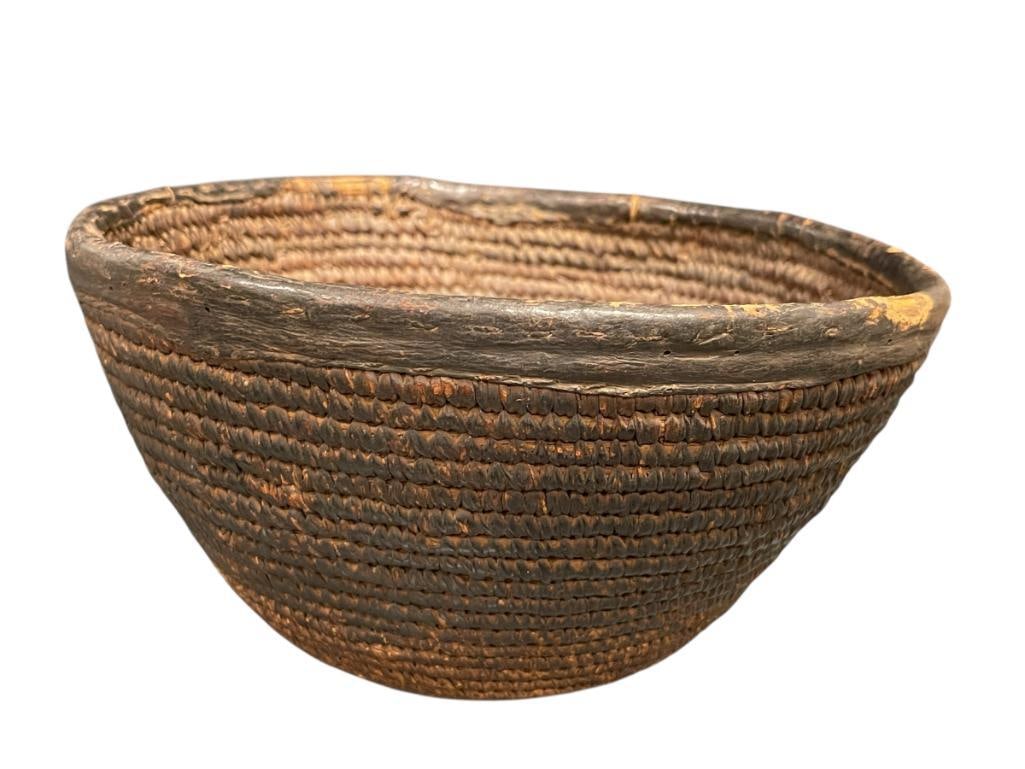 19TH CENTURY NATIVE AMERICAN TIGHTYLY COILED BASKET WITH ANIMAL HIDE WRAPPED RIM (1 of 10)