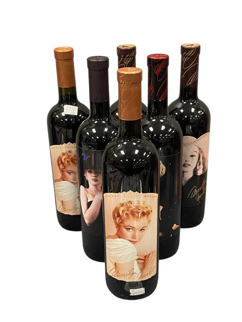 SIX SEALED NAPA VALLY MERLOT MARILYN MONROE COLLECTOR WINE BOTTLES: EACH BOTTLE FEATURES DIFFERENT ILLUSTRATION OF MARILYN MONROE, WORLD RENOWN ACTRESS AND MODEL FROM THE EARLY TO MID 20TH CENTURY, YEARS INCLUDED 1996, 1998,1999, AND 2002 ALL BOTTLES ARE SEALED, MUST