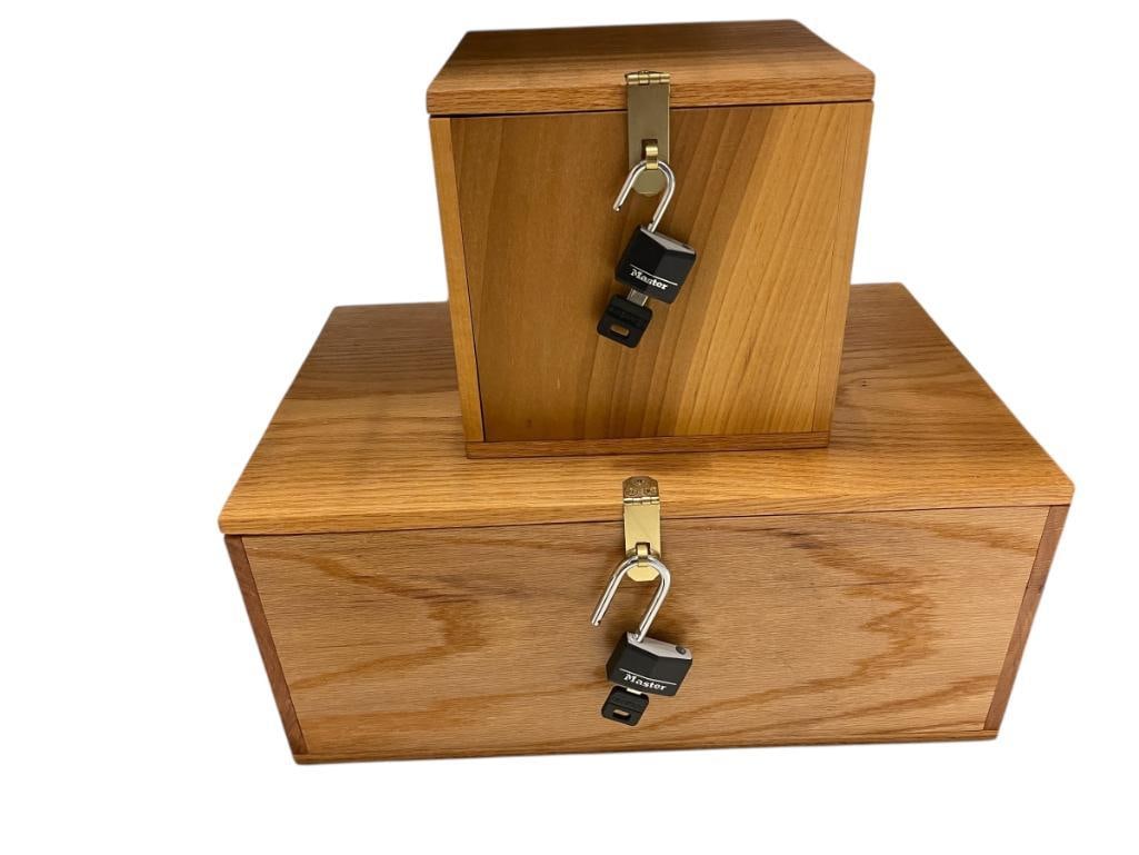 TWO LOCKABLE OAK STORAGE BOXES WITH MASTER LOCK PAD LOCKS AND KEYS: GOOD CONDITION LARGEST IS 18" X 11" X 8"