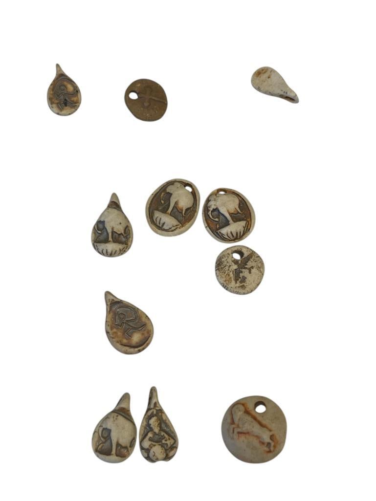 ELEVEN CARVED STONE AMULETS WITH INTAGLIO CUT ANIMAL IMAGES (1 of 6)