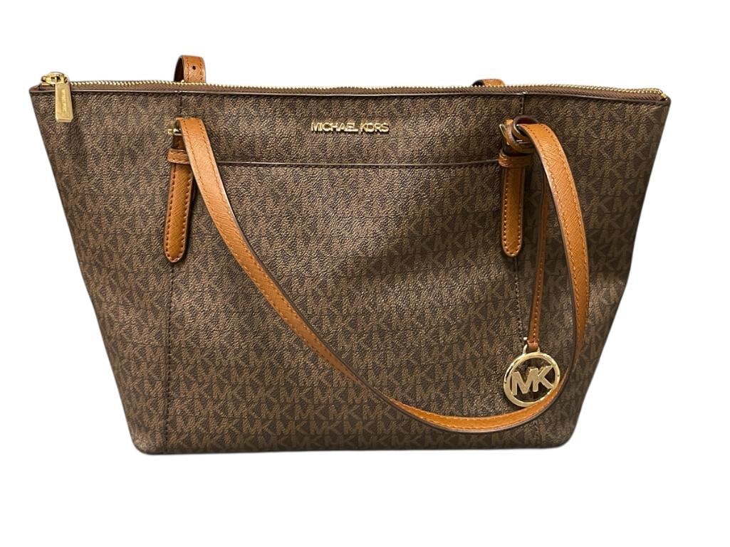 MICHAEL KORS BROWN SMALL MONOGRAM SATCHEL: DOUBLE HANDLE WITH BRASS FINISH HARDWARE, CLOTH LINED, SHOWS LITTLE TO NO SIGNS OF USE 16" X 5" X 10" 