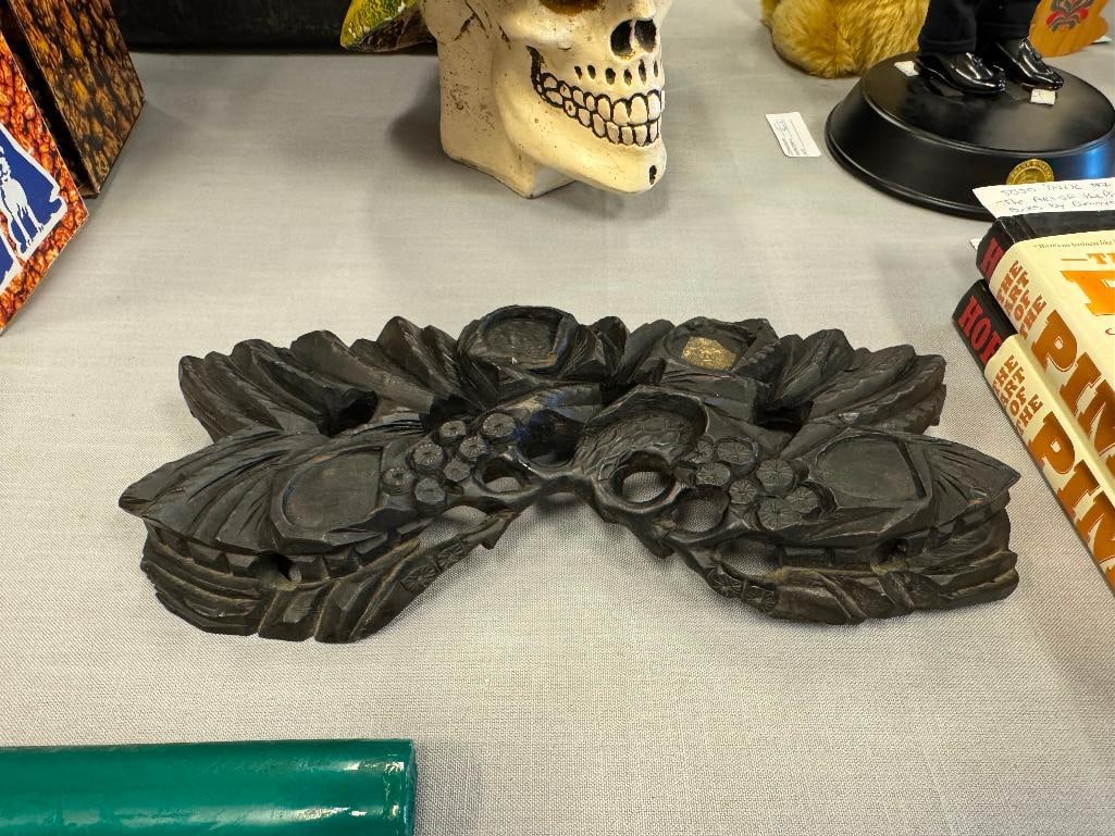EBONIZED CARVED WOOD CHINESE STAND POSSIBLY USED AS A STAND FOR A SCULPTURE OR CARVINGS: LEAF AND FLORAL CARVED, HAS FOUR SLOTS WERE SCULPTURE WOULD STAND OR BE SEATED, COULD BE REPURPOSED 13" X 7" 