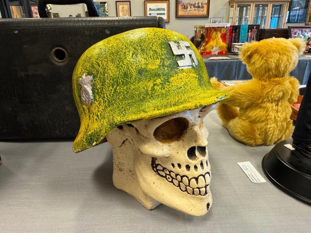 STYLIZED CERAMIC SKULL WITH NAZI HLEMET COIN BANK: HAND PAINTED CERAMIC SKULL COIN BANK, DOES HAVE CHIPS UNDER THE HELMET, MADE IN MEXICO 10" H 