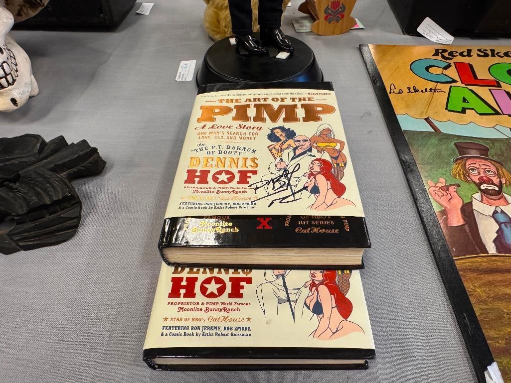 2015 FIRST EDITION THE ART OF THE PIMP BY DENNIS HOF BOOKS, ONE IS SIGNED: DENNIS HOF WAS A BUSINESS MAN AND POLITICIAN WHO OWNED SEVERAL BROTHELS INCLUDING THE FAMOUS MOONLIGHT BUNNYRANCH, EACH BOOK INCLUDES THE DUST JACKET, ONE BOOK IS SIGNED ON THE JACKET AND ON THE
