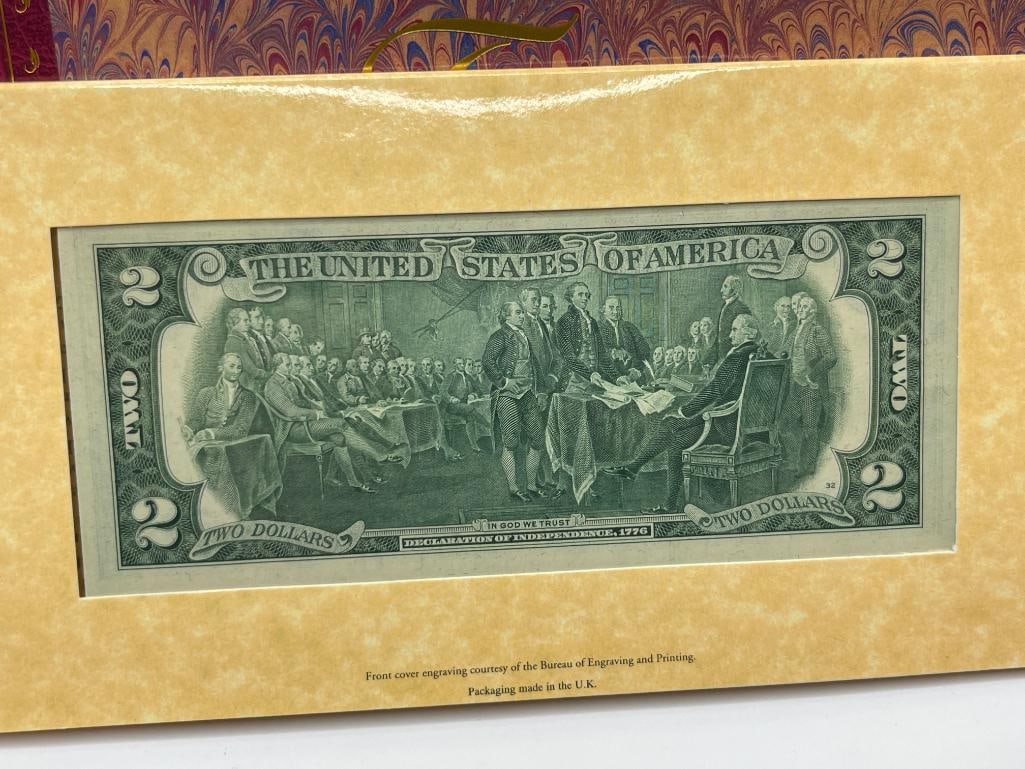 THE THOMAS JEFFERSON COINAGE AND CURRENCY SET FEATURING A 90% SILVER DOLLAR - 10