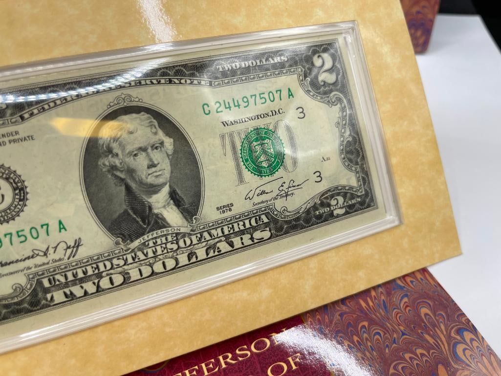 THE THOMAS JEFFERSON COINAGE AND CURRENCY SET FEATURING A 90% SILVER DOLLAR - 9