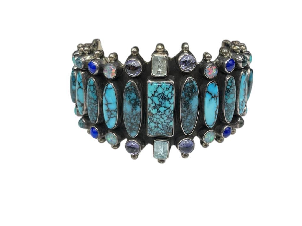 VINTAGE NAVAJO STERLING SILVER SPIDERWEB TURQUOISE AND GEMSTONE CUFF BRACELET (1 of 7)
