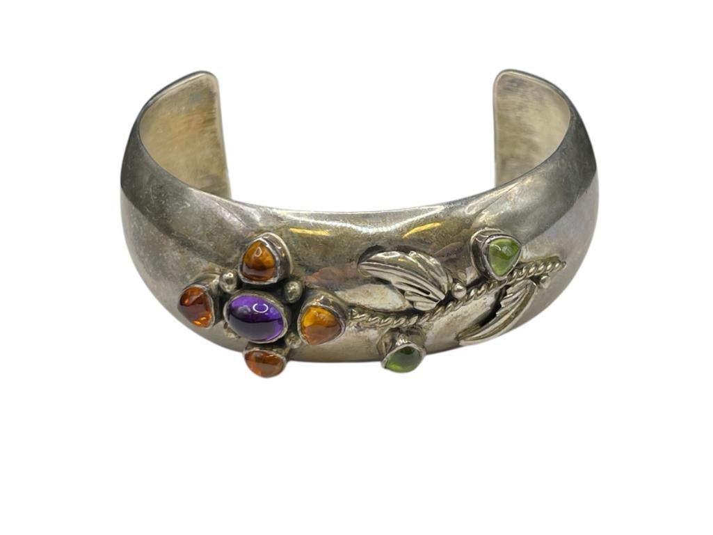VINTAGE NAVAJO LORENZO SECATERO STERLING SILVER CUFF BRACELET FEATURING AMBER AND PERIDOT (1 of 6)