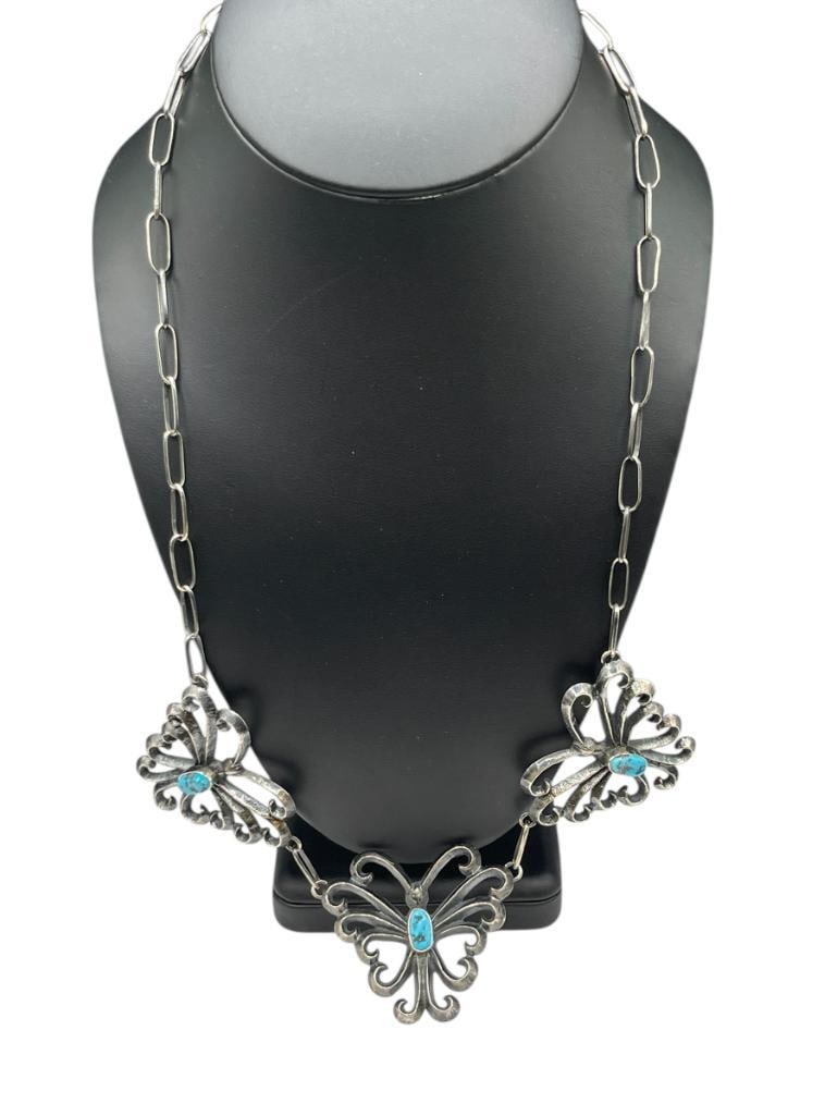 ANTIQUE NAVAJO ARTIST SIGNED SAND CAST STERLING SILVER AND TURQUOISE BUTTERFLY NECKLACE: ARTIST SIGNATURE IS ILLEGIBLE 24", 1 3/4" BUTTERFLIES, 68.10 GRAMS 