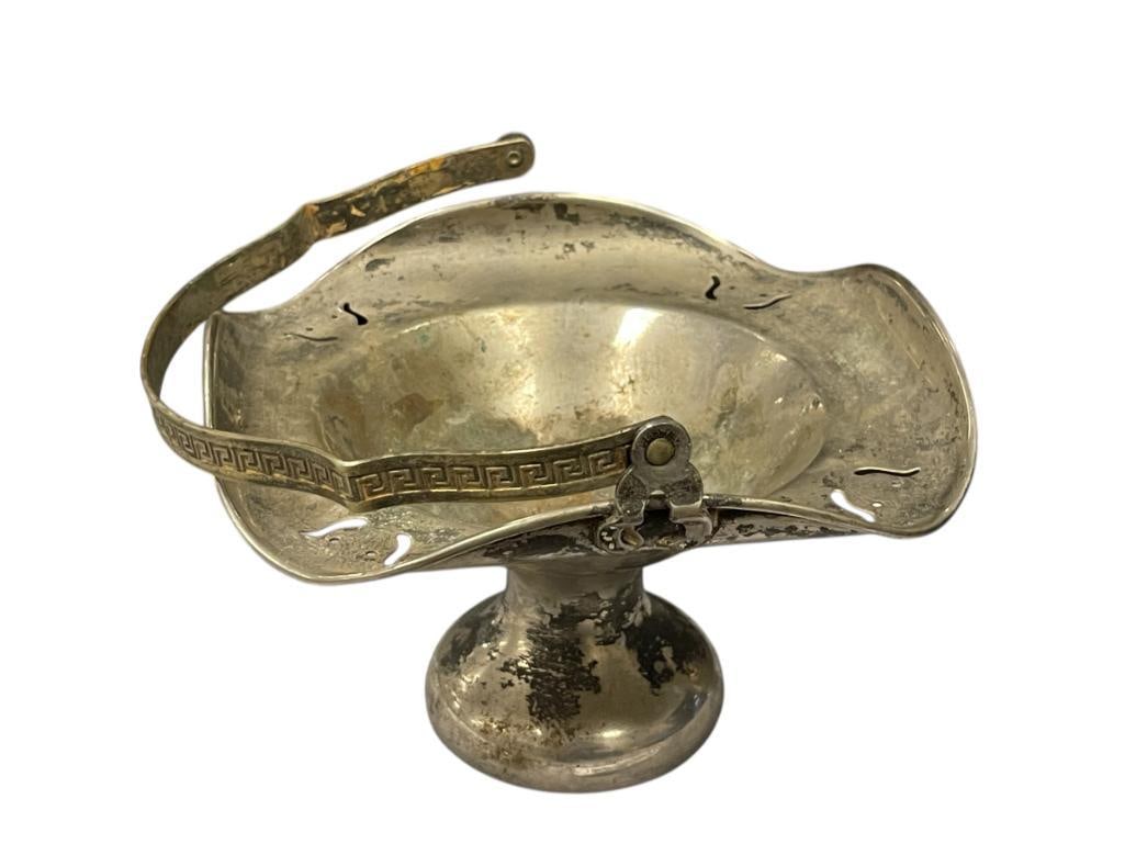 EARLY 20TH CENTURY QUADRUPLE PLATED BEDESTAL BASKET WITH GREEK STYLED HANDLE: RUFFLED RIM WITH ROUND BASE AND PIERCED RIM WITH URN DESIGN 6 3/4" 