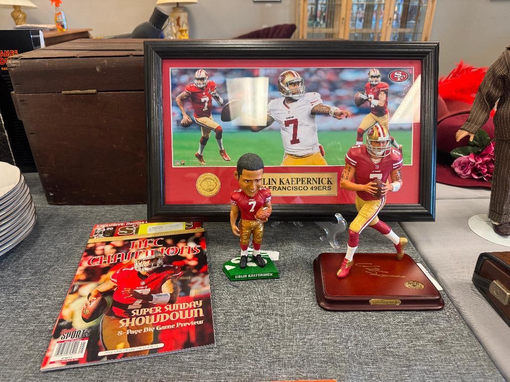 COLIN KAPERNICK S.F. 49ERS FOOTBALL COLLECTIBLES / MEMORABILIA: THE DANBURY MINT LIMITED EDITION FIGURINE, LEGENDS OF THE FIELD BOBBLEHEAD, COLLAGE,A ND TWO MAGAZINES 9" FIGURINE, 8" BOBBLEHEAD, 19 1/2" X 12" COLLAGE 