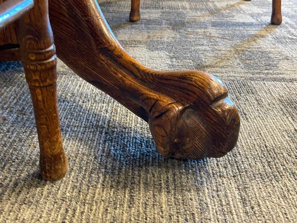 VINTAGE DARK STAINED OAK PEDESTAL CLAW FOOT DINING TABLE WITH SIX PRESSED BACK CHAIRS WITH LEAVES - 7