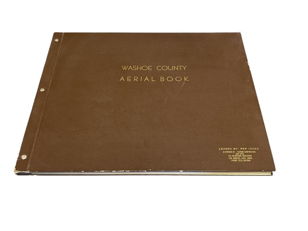 WASHOE COUNTY 1973-74 AERIAL BOOK WITH AERIAL PHOTOS / MAPS LARGE FORMAT: BOOK SHOWS AERIAL PHOTOGRAPHS OF 50 DIFFERENT MAPS FROM NORTHWEST RENO, SPANISH SPRINGS, RANCHO SAN RAFAEL, FAIRGROUNDS, AND MORE, BROWN HARDCOVER WITH GILT LETTERING, COVERS DO SHOW WEAR ALONG THE ED