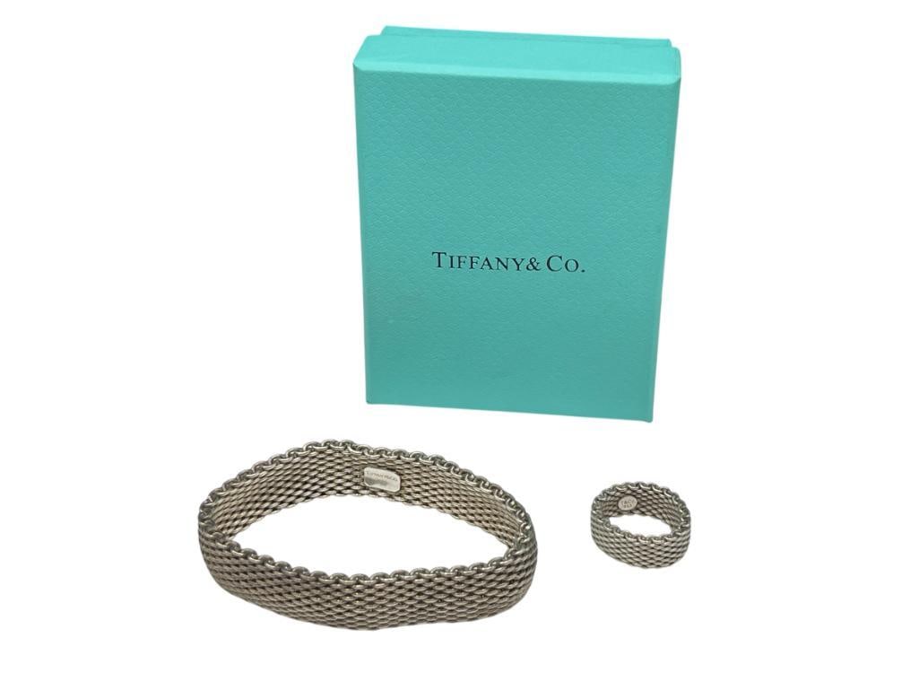 TIFFANY & CO. DESIGNER SIGNED STERLING SILVER MESH BRACELET AND RING: INCLUDES ORIGINAL TIFFANY & CO. BOX, BOTH PIECES ARE MARKED BY DESIGNER 7 1/2" X 5/8" BRACELET, RING IS SIZE 8 AND 3/8" THICK, 63.70 GRAMS
