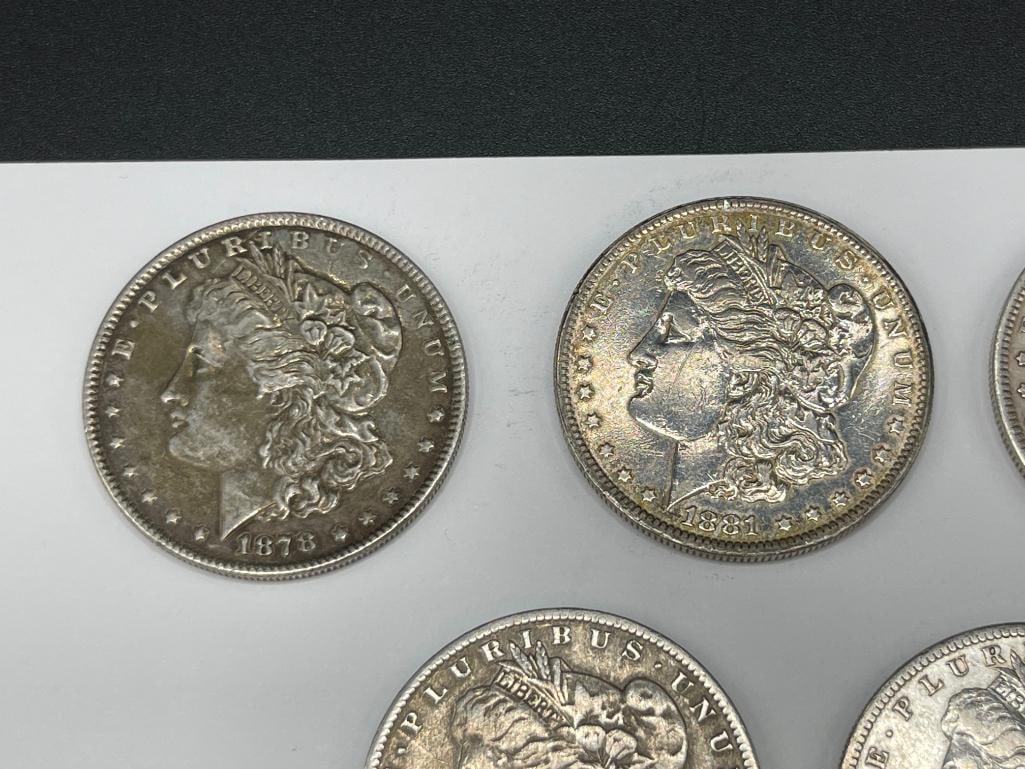 FIVE U.S. MORGAN SILVER DOLLARS FEATURING VARIOUS DATES AND MINT MARKS - 2