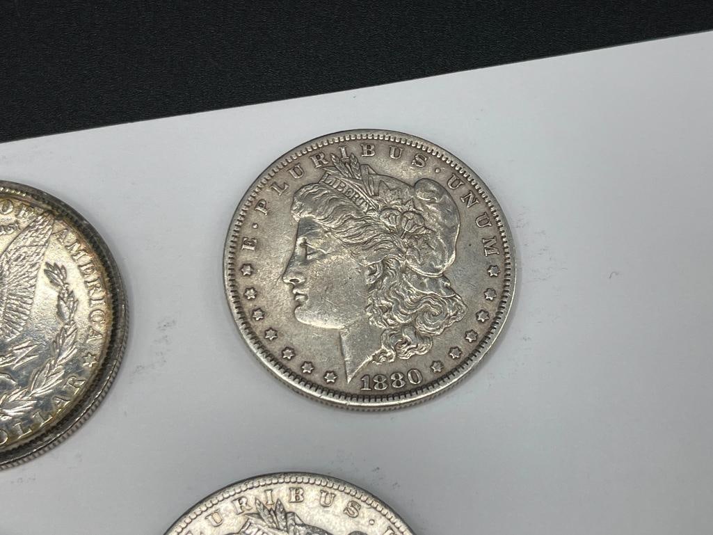 FIVE U.S. MORGAN SILVER DOLLARS FEATURING VARIOUS DATES AND MINT MARKS - 5