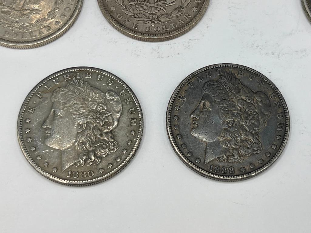 FIVE U.S. MORGAN SILVER DOLLARS FEATURING VARIOUS DATES AND MINT MARKS - 6