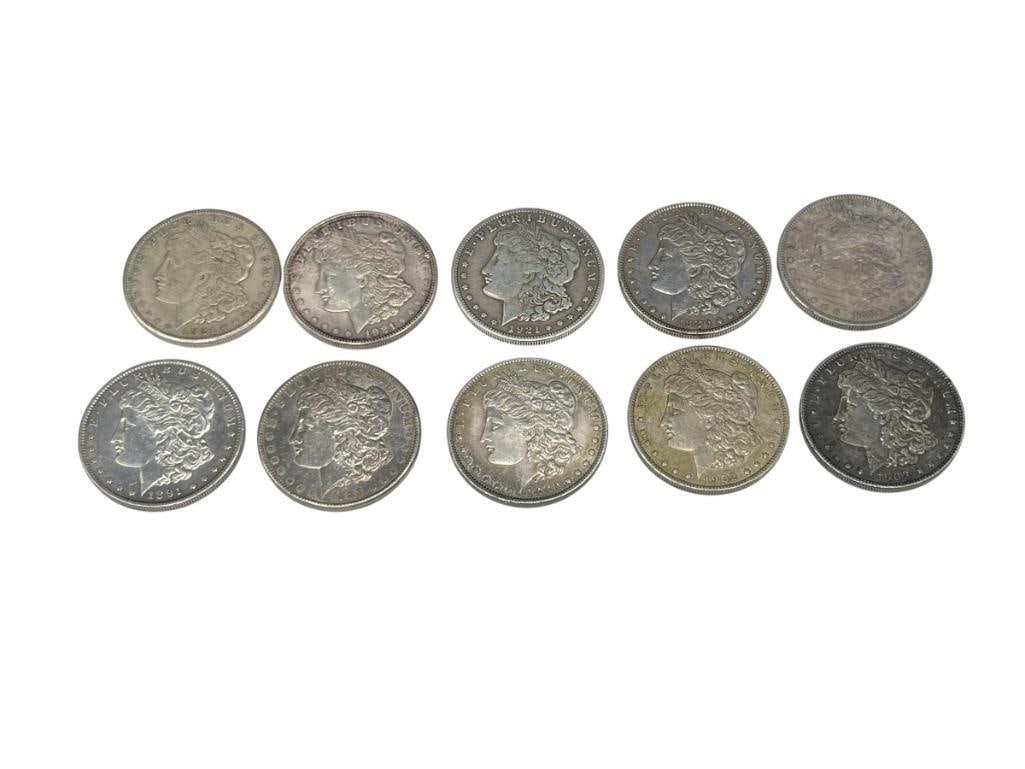 TEN U.S. MORGAN SILVER DOLLARS FEATURING VARIOUS DATES AND MINT MARKS: 90% SILVER 