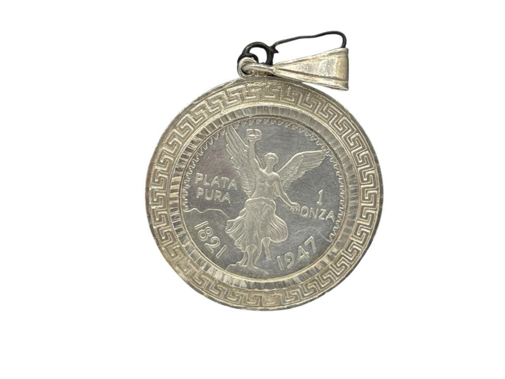 1947 MEXICO COMMEMORATIVE .999 FINE SILVER MEDALLION ENCASED IN STERLING SILVER PENDANT: PENDANT FEATURES GREEK KEY PATTERN 2 3/4" WITH BAIL, 41.24 GRAMS 